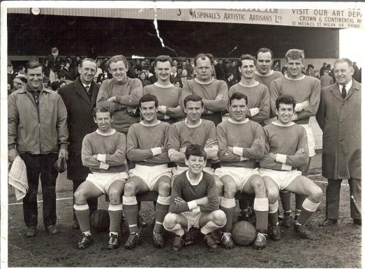 Wigan Athletic 1964-65. Back row, Wilf Birkett (Trainer),  Les Jackson (Chairman), Alan Halsall, Roy Wilkinson, Alf Craig, Ralph Gubbins, Derek Houghton, Derek Crompton, Frank Latham  Front Row: Les Campbell, Carl Davenport, Harry Lyon, Allan Brown (Player Manager), Walter Stanley 